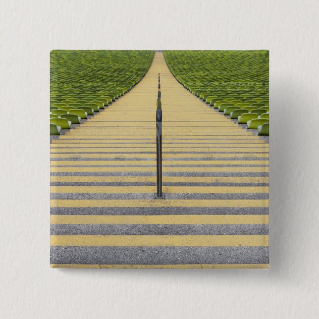 Stadium stairway between rows of green seats 15 cm square badge (Front)