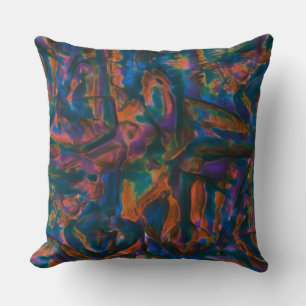 Stained and dented blue shades of aged copper cushion