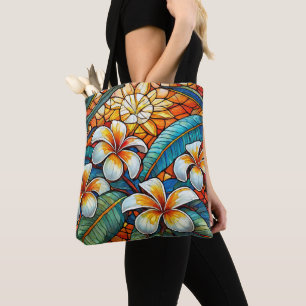 Stained glass style plumeria on orange tote bag