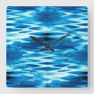 Stained gradient blue forming abstract whirlpool square wall clock