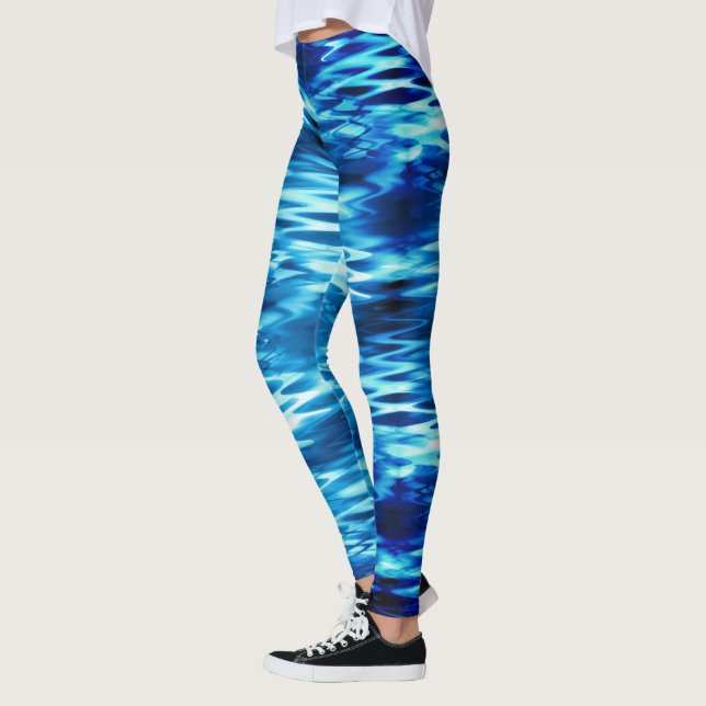 Stained gradient blue forming abstract whirlpool t leggings (Left)