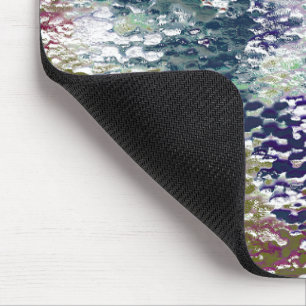 Stains and splatters of paint under hammered glass mouse pad