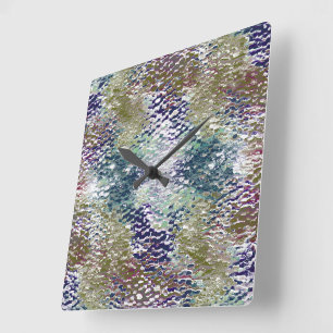 Stains and splatters of paint under hammered glass square wall clock