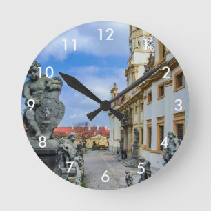 Stairs with stone angels at Loreto Prague church Round Clock