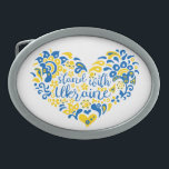 Stand with Ukraine lettering and heart Belt Buckle<br><div class="desc">Stand with Ukraine lettering and heart in Ukrainian flag colours and transparent ethnical pattern Folk art illustration heart and lettering in Ukrainian flag colours and ethnical pattern heart, shape, Purity, Allegory, peace sign, peace symbol, peace, no war, stop war, antiwar, Ukraine, Ukrainian, ethnical pattern, Ukrainian flag, blue and yellow, proud,...</div>