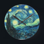 Starry Night art Round Clock<br><div class="desc">Starry Night is popular vintage art by Vincent van Gogh. Post impressionist style,  painted in 1889 while the artist was in Saint Rémy,  France.</div>