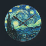Starry Night art Round Clock<br><div class="desc">Starry Night is popular vintage art by Vincent van Gogh. Post impressionist style,  painted in 1889 while the artist was in Saint Rémy,  France.</div>