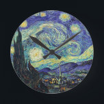 Starry Night by van Gogh Round Clock<br><div class="desc">Van Gogh was obsessed by the symbolism of luminous objects and of colour. The lamp was a symbol of calm and security. The star symbolised faith,  and gaslight,  human realities. Deep ultramarine blue was infinity,  while red and green expressed "those terrible things,  men's passions.</div>