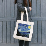 Starry Night by Vincent van Gogh Tote Bag<br><div class="desc">A tote bag with Starry Night (1889) an oil painting by Vincent Van Gogh (1853-1890),  depicting the view outside the window from Van Gogh's room at the sanitorium in Saint-Remy-de-Provence,  Southern France.</div>