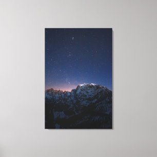 Stars and snowy mountains canvas print