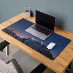 Stars and snowy mountains desk mat