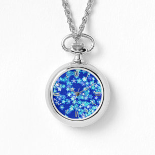 Stars, shades of pale blue against dark blue watch
