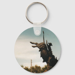 statue of a bullrider key ring