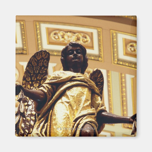 Statue of angel in gold magnet (Front)
