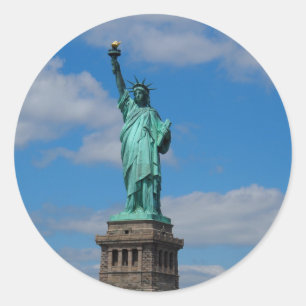 Statue of Liberty against a blue sky Classic Round Sticker