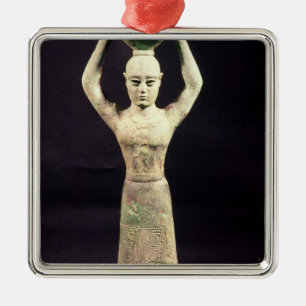 Statuette of offering bearer with votive metal tree decoration