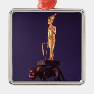 Statuette of the king upon a leopard metal tree decoration