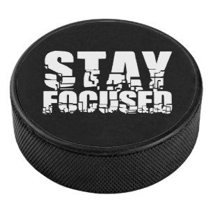 Stay Focused Motivational Phrase with White Text Hockey Puck