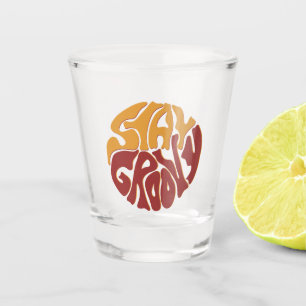 Stay Groovy with a Splash of Red and Yellow Shot Glass