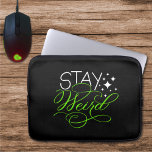 Stay Weird Cosmic Quirky Motivational Phrase Laptop Sleeve<br><div class="desc">Add a bold splash of personality with this vibrant “Stay Weird” design, hand-lettered by the artist and accented with magical stars. The contrasting neon green and white lettering pops against a deep black background, creating a visually striking and uplifting piece for anyone who dares to be different. Whether you're shopping...</div>