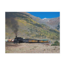 Steam train leaving town