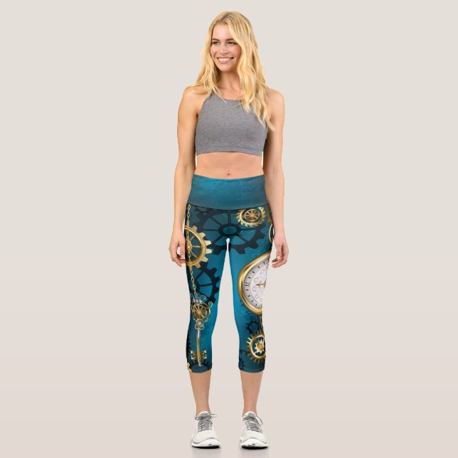 Steampun turquoise Background with Gears Capri Leggings (Front)
