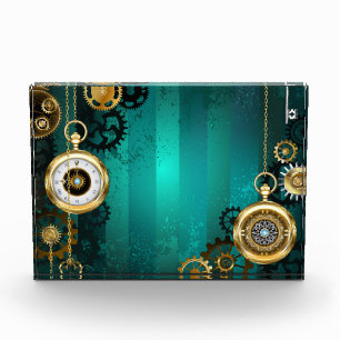 Steampunk Jewellery Watch on a Green Background Photo Block