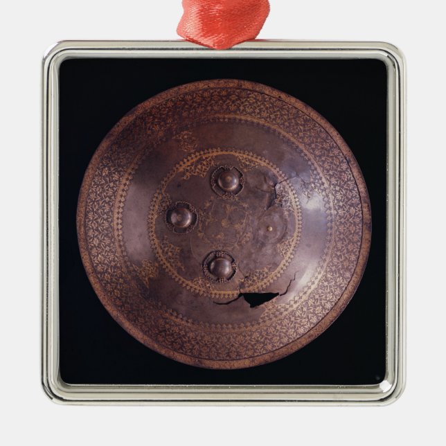 Steel shield with intricate gold decoration (Front)