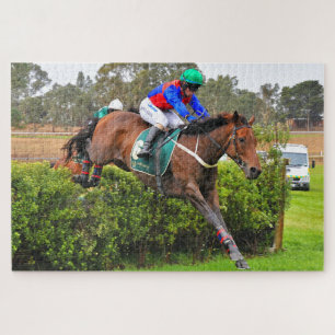 Steeplechase horse and rider over the jump jigsaw puzzle