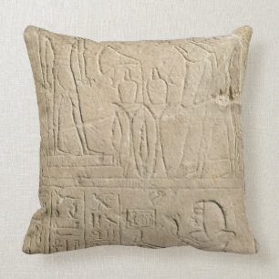 Stela depicting Ramesses II offering incense to hi Cushion