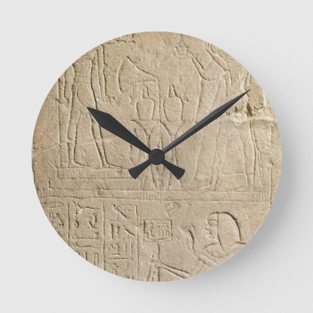 Stela depicting Ramesses II offering incense to hi Round Clock (Front)