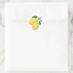 Sticker with big fresh lemons and green leaves