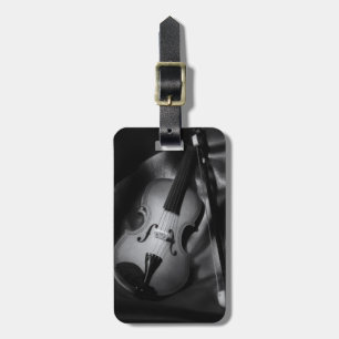 Still-life b&W image of a violin Luggage Tag