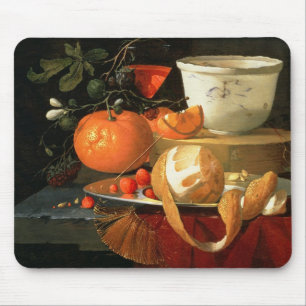 Still life of an orange mouse pad
