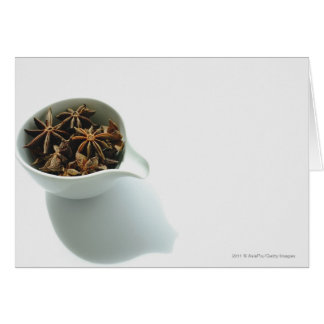 Still life of spices in a white bowl