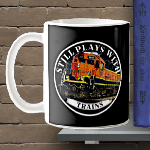 Still Plays with Trains Orange Black Diesel Train Coffee Mug