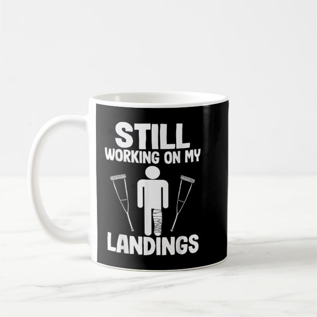 Still Working On My Landings Funny Get Well Broken Coffee Mug (Left)