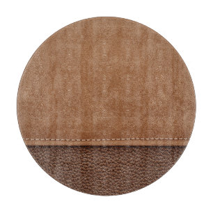 Stitched leather: grey, black background. cutting board