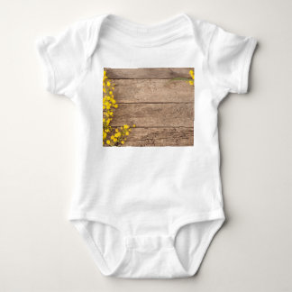 Stock photography, styled vintage concept. baby bodysuit