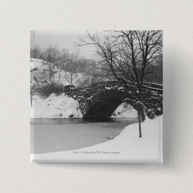 Stone bridge over snow covered river 15 cm square badge (Front)