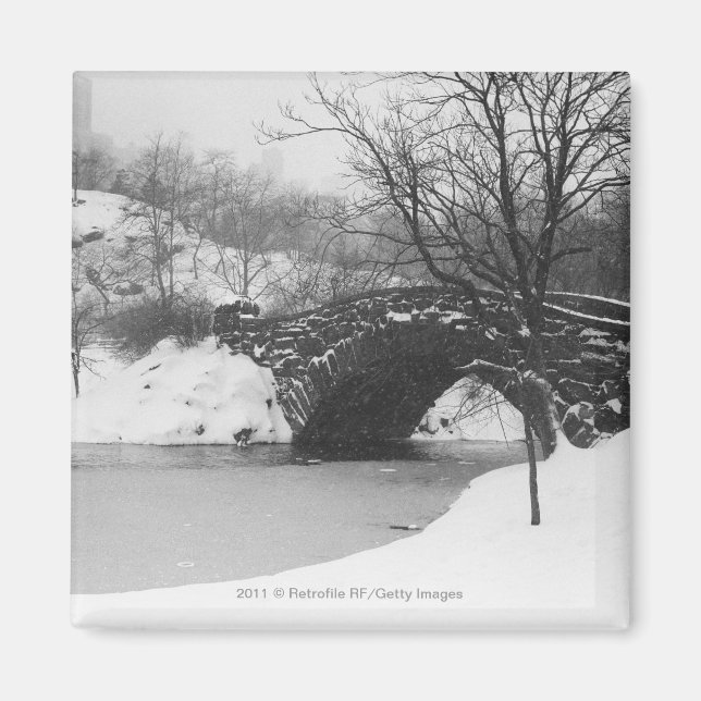 Stone bridge over snow covered river magnet (Front)