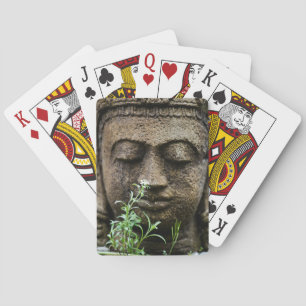 Stone garden statue with flower playing cards