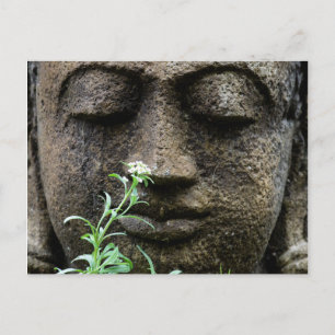 Stone garden statue with flower postcard