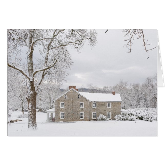 Stone mansion in snow with hills (Front Horizontal)