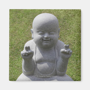 Stone statue of happy Buddha Magnet