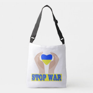 Stop war Ukrainian flag heart in hands  Crossbody Bag