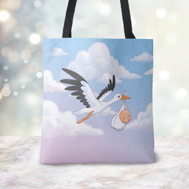 Stork Carrying a Baby Cloudy Sky Tote Bag (Creator Uploaded)