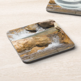 Stormy stream in spring coaster