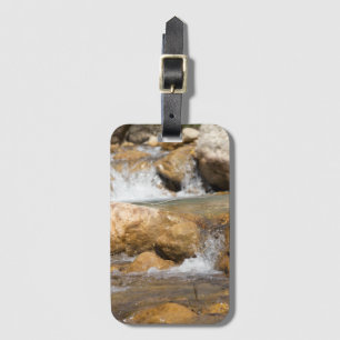 Stormy stream in spring luggage tag