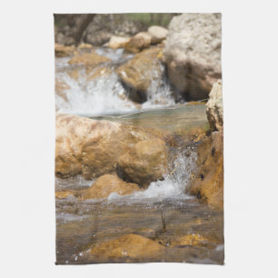 Stormy stream in spring tea towel